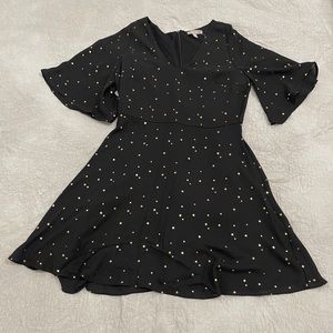 Black dress with gold stars